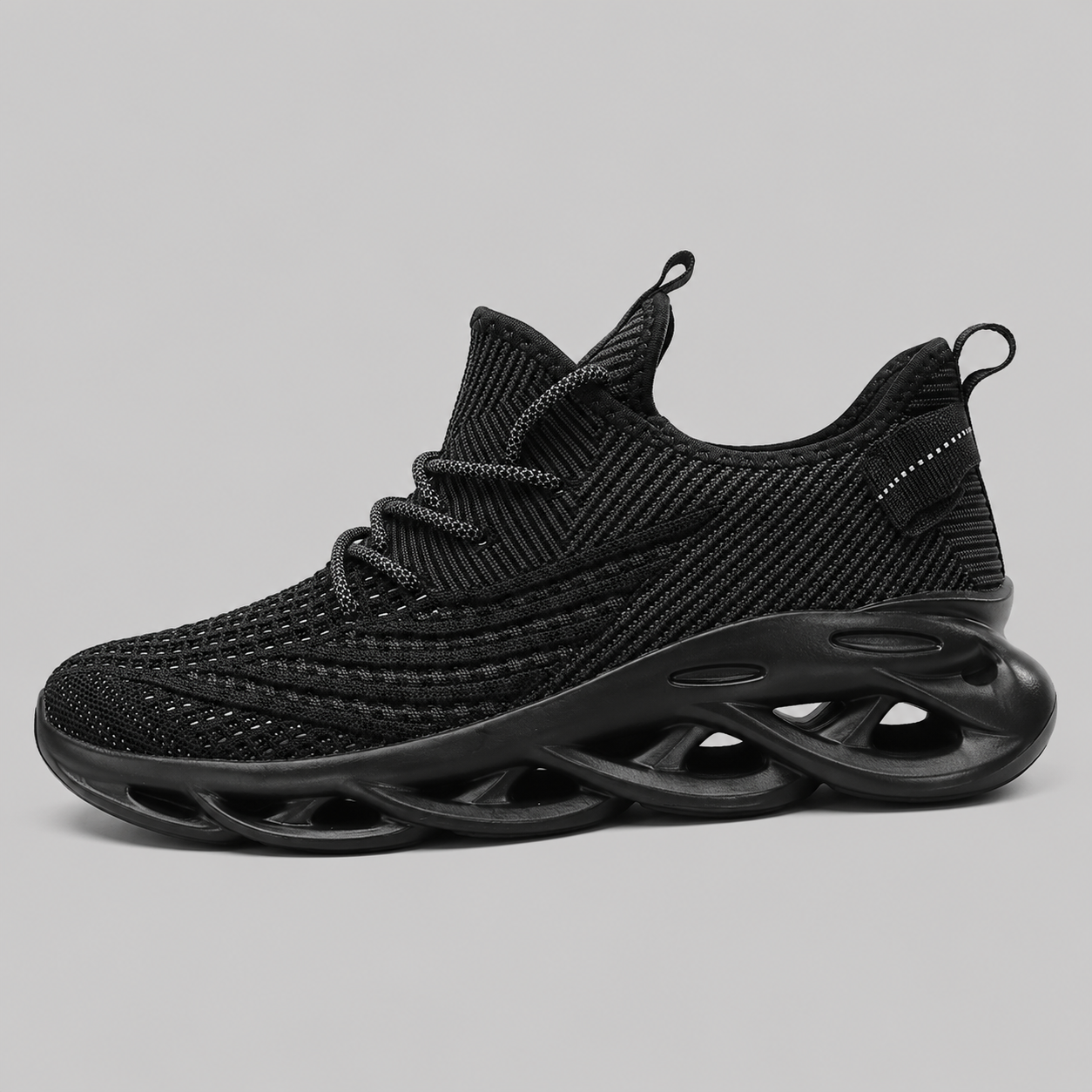 Gray athletic shoe with a visible 'Comfort' label on a white background