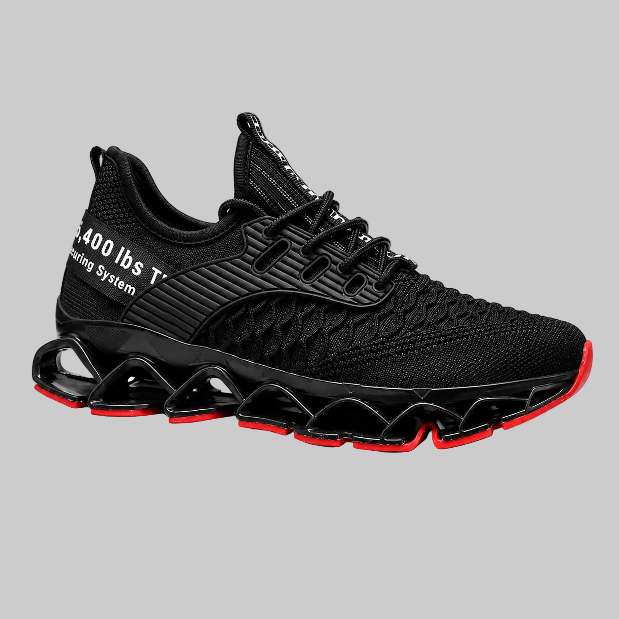 A black athletic sneaker with a textured knit upper, black laces, and a distinctive wavy black sole with bright red accents on the outsole, shown against a plain white background.