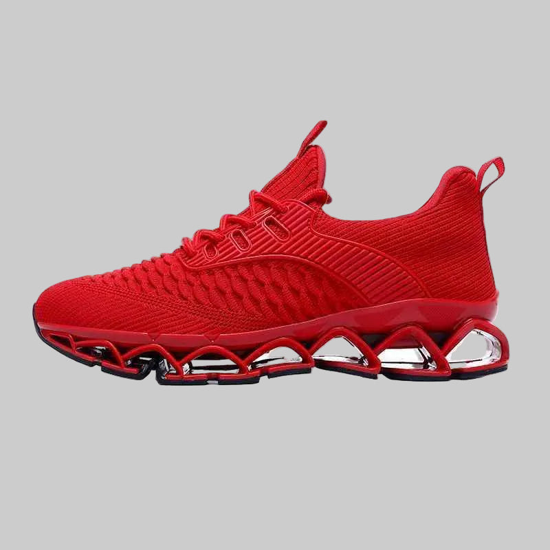 Red athletic shoe with unique sole design on a white background