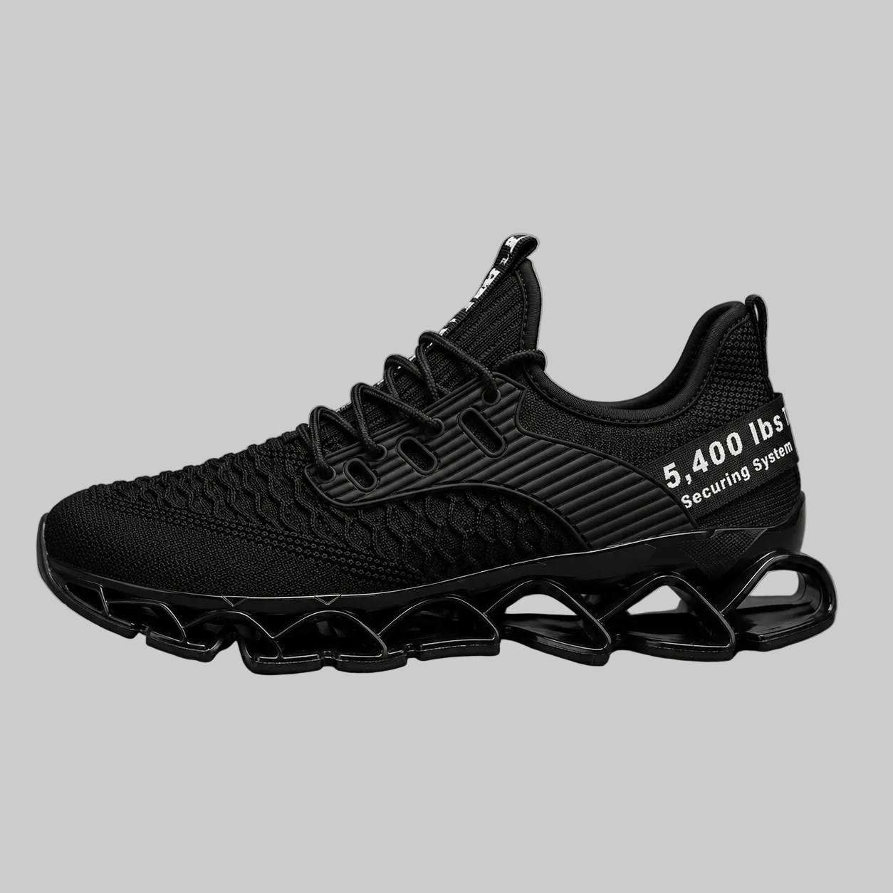 A black athletic sneaker with a textured knit upper, black laces, and a distinctive wavy black sole, shown from a side profile on a gray background. White text on the heel reads '5,400 lbs Securing System'.