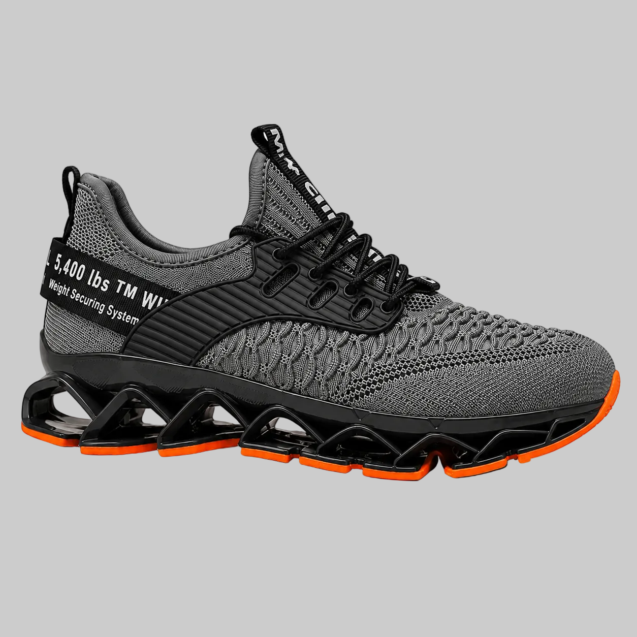 A single gray and black athletic sneaker with a unique wavy black sole and bright orange outsole accents, shown from a side profile on a white background.